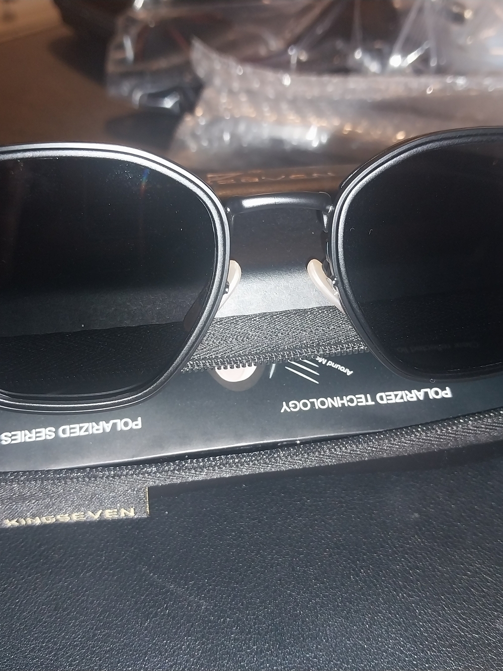 Classic Round Polarized Sunglasses in Black. Bin 02